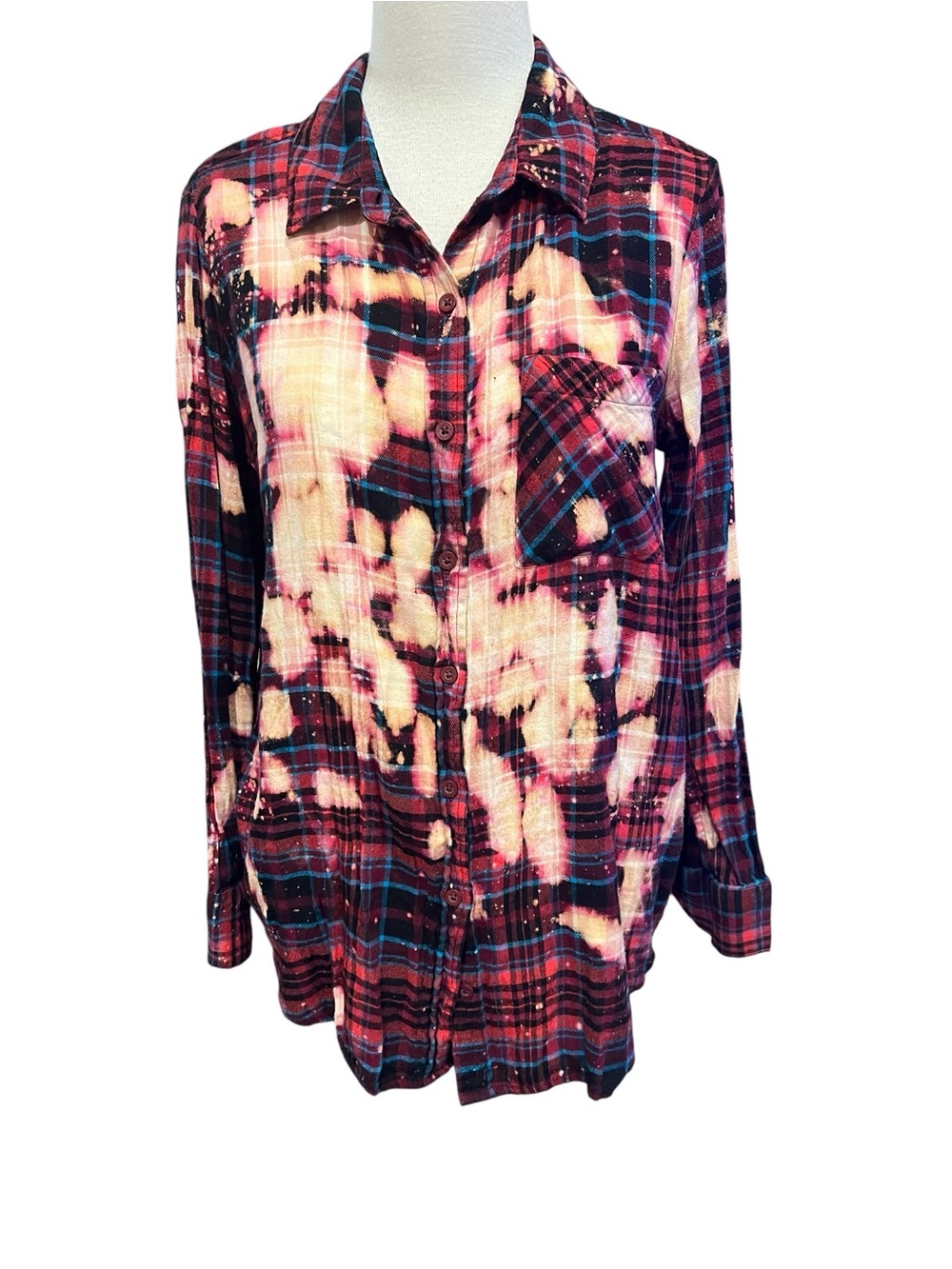 Bleached plaid flannel shirt that reads JESUS AND FLANNEL Kind of day